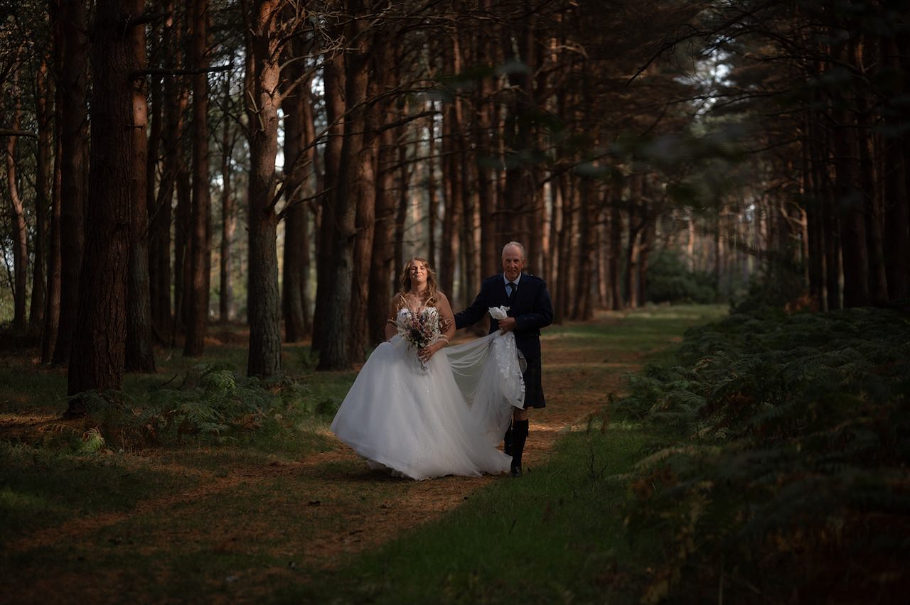 Bride and dad walking to the ceremony