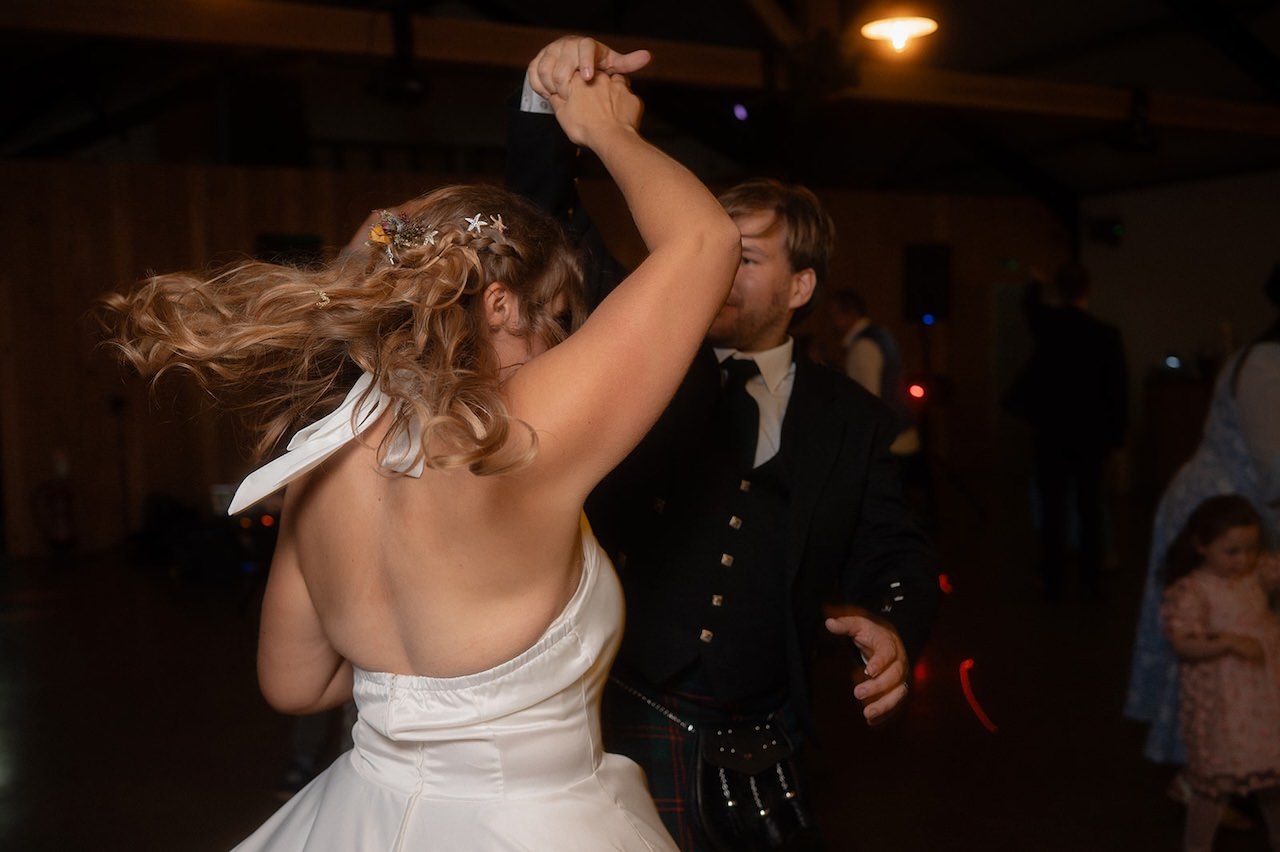 Bride and groom dancing 