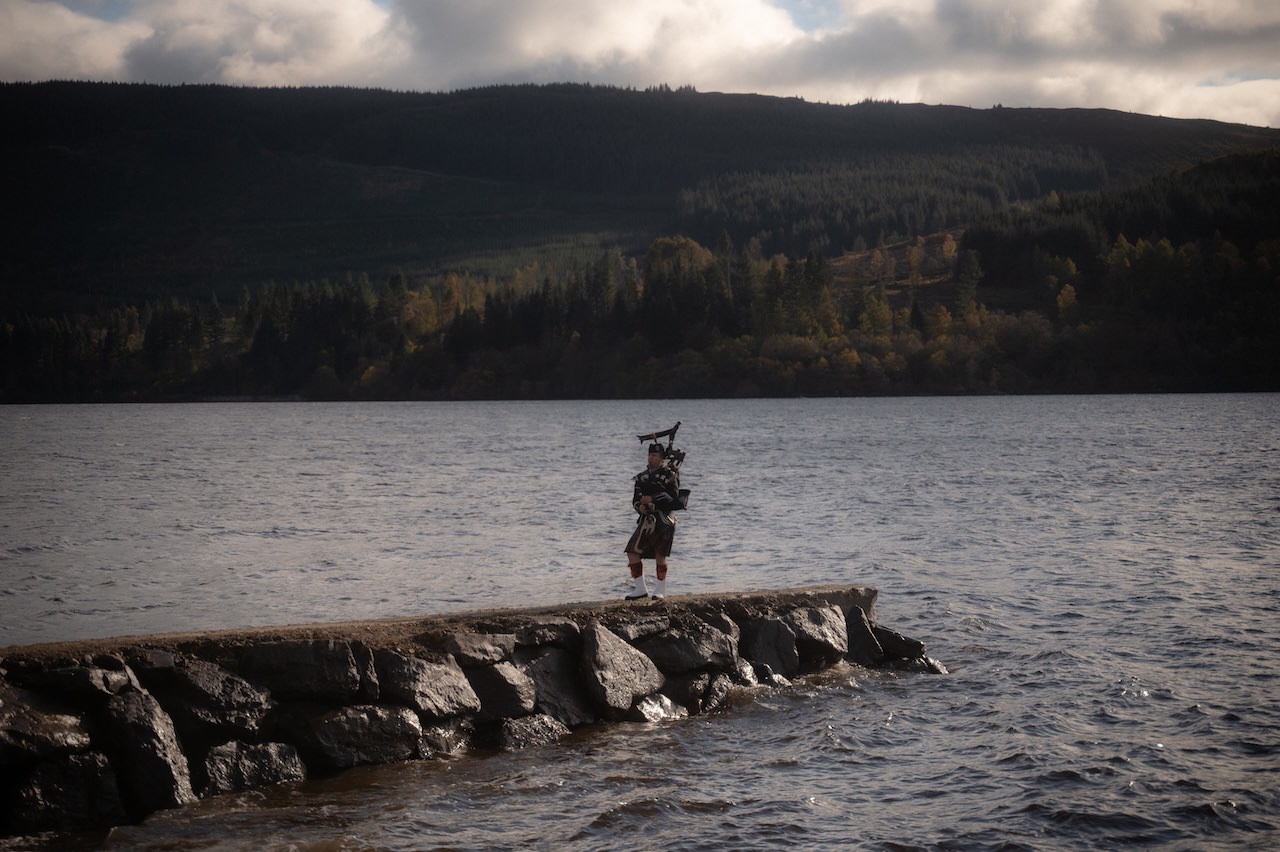5 Reasons that make Venachar Lochside Venue Amazing for cosy, intimate weddings 2 Venachar Lochside Wedding Scottish Piper